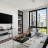 living area with large window and decorations