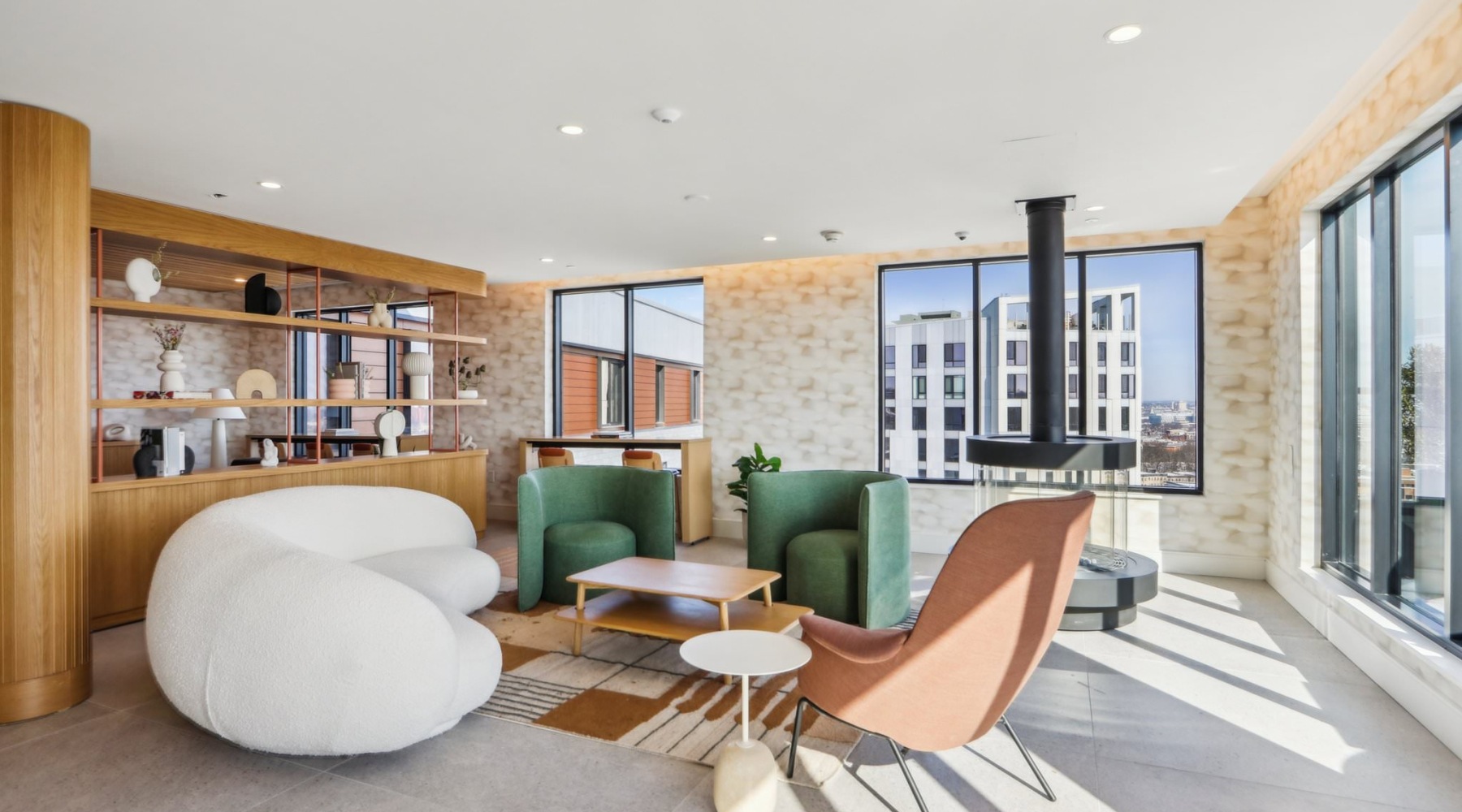 a lounge with chairs and tables