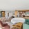 lounge with seating and kitchen area