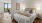 a bedroom with a large bed