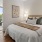 a bedroom with a large bed