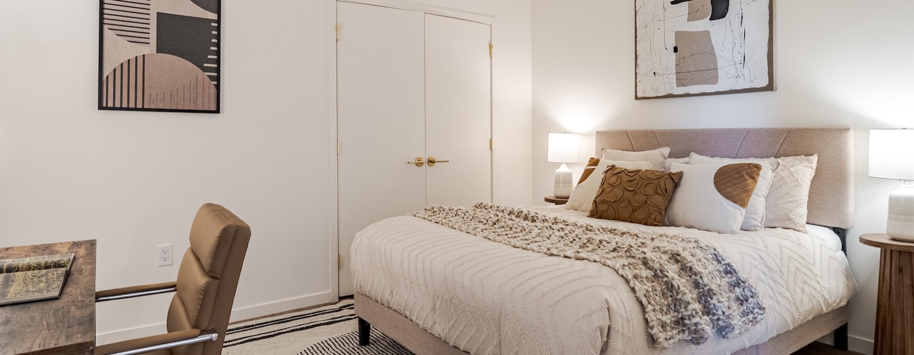 bedroom with a bed, desk and chair