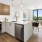 a kitchen with a stove and oven