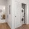a bathroom with a toilet and a washer