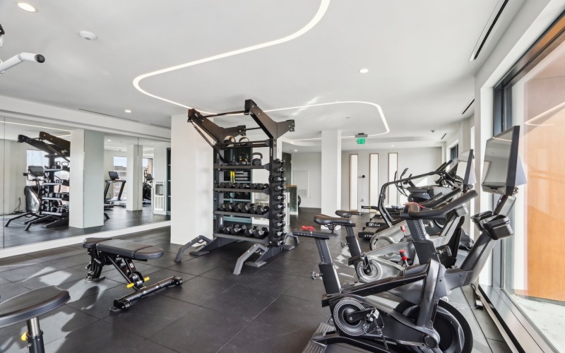 fitness center with exercise equipment