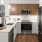 a kitchen with white cabinets