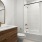 a bathroom with a tub toilet and sink