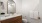 a bathroom with a large mirror