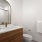 a bathroom with a large mirror