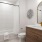 a bathroom with a tub toilet and sink
